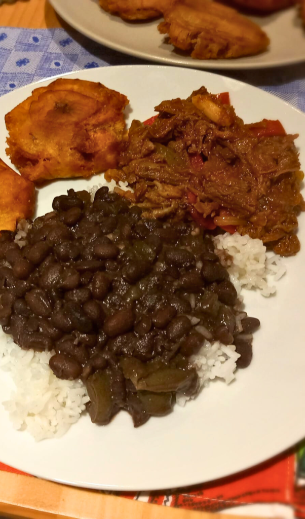 ropa vieja with white rice and black beans